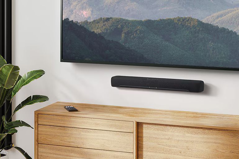 B200A wall-mounted below a TV