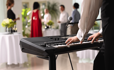 Yamaha Arranger Workstation PSR-SX920 being played at a party venue.