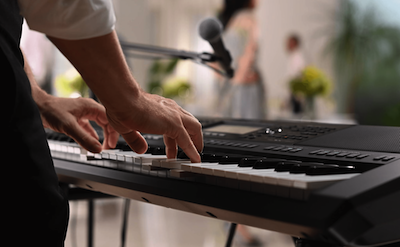 Yamaha Arranger Workstation PSR-SX720 being played at a party venue